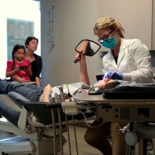 Portland dentist performing root canal procedure at Timber Dental