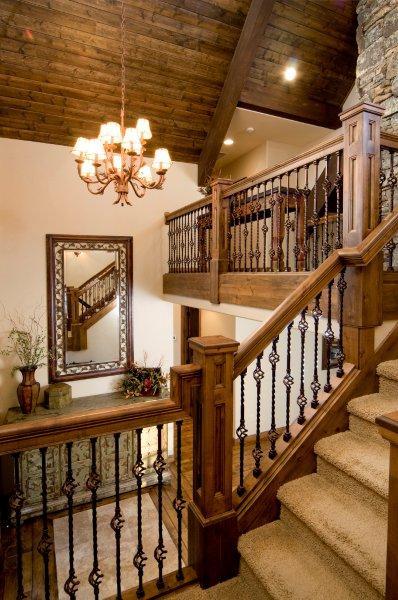 Caldera Springs stair and fireplace Lodge living