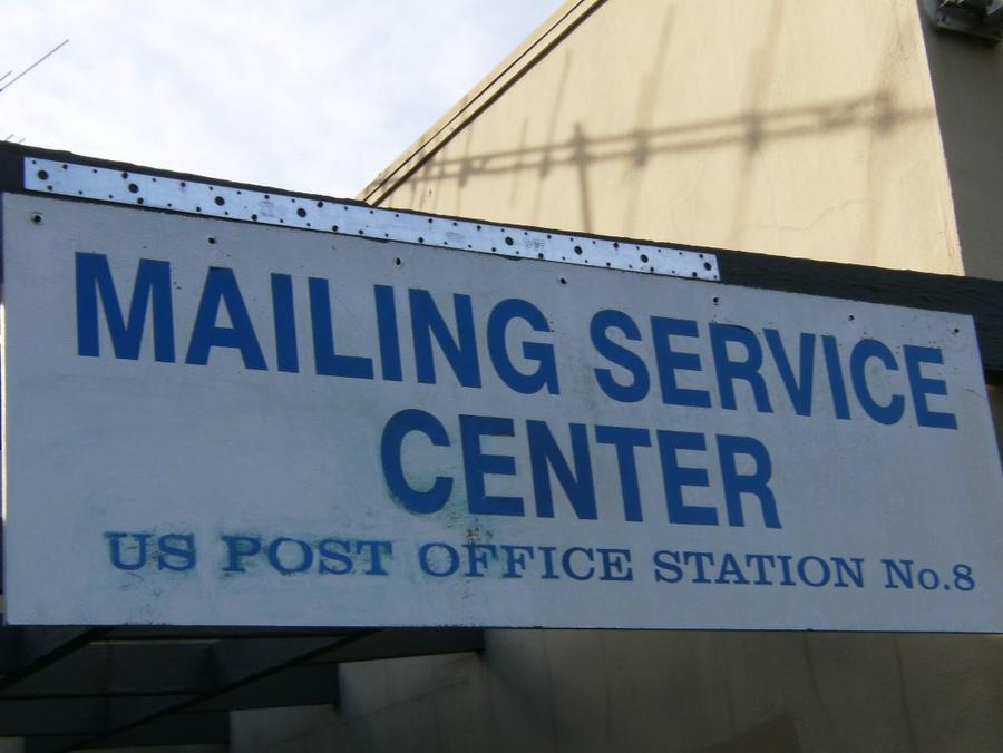 Mailing Service Center - rear entrance sign