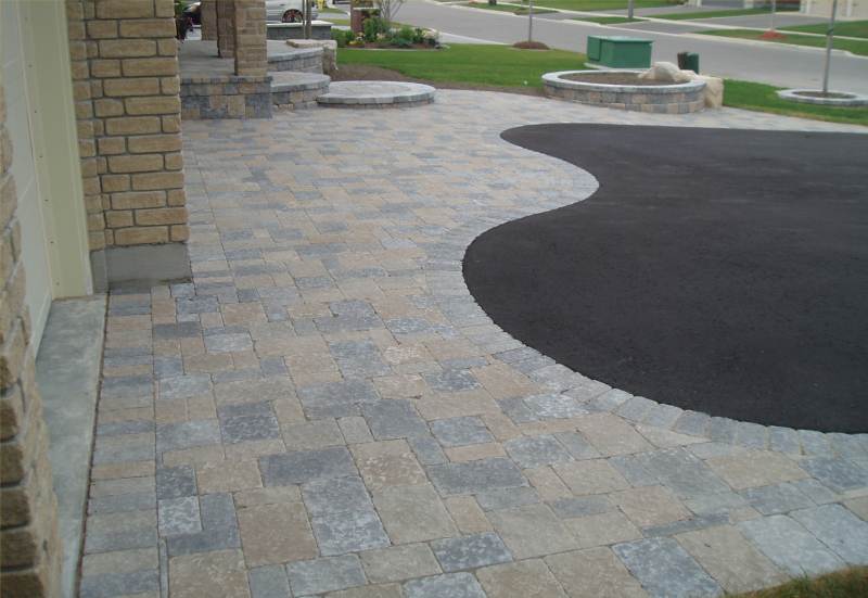 Asphalt for the cars, and more "paver" for the people!