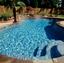 Gunite Pebbletec Pool Designed by AquaRama Pools & Spas