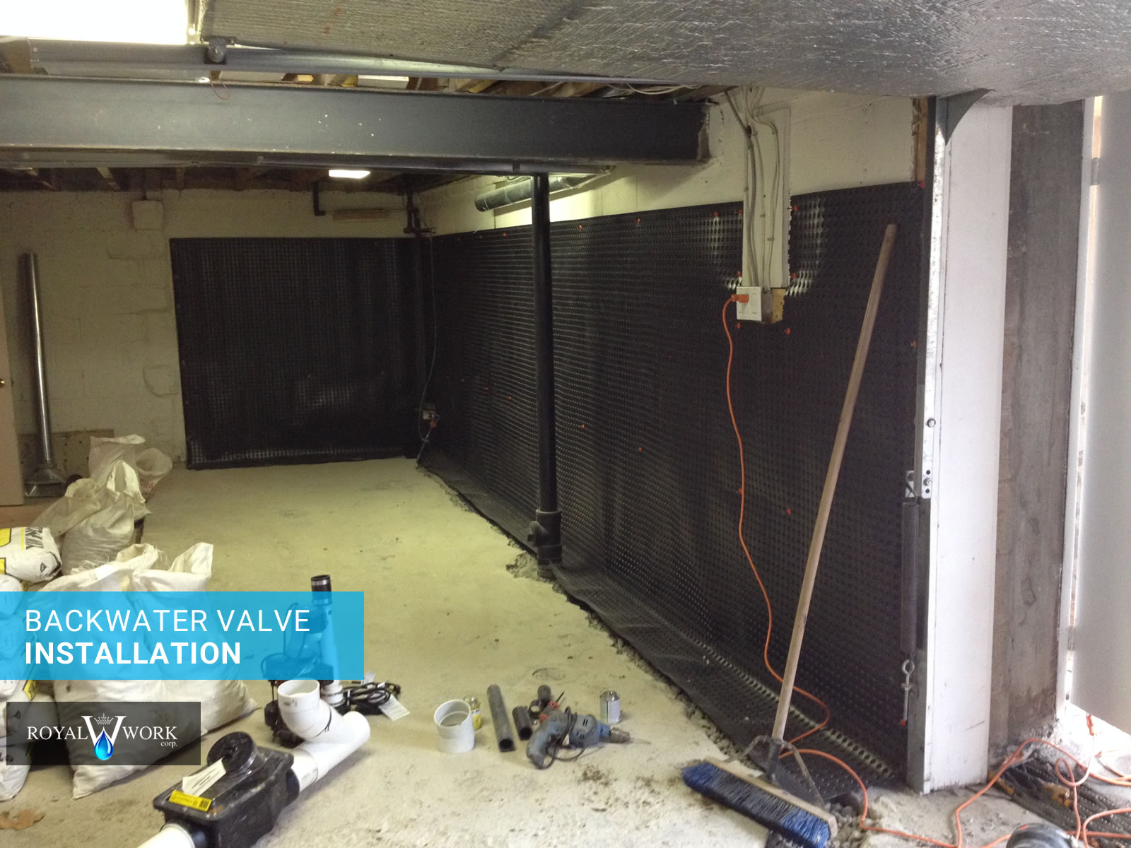 Full basement waterproofing with backwater valve installation