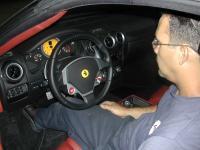 Pedro Inspecting a Ferrari